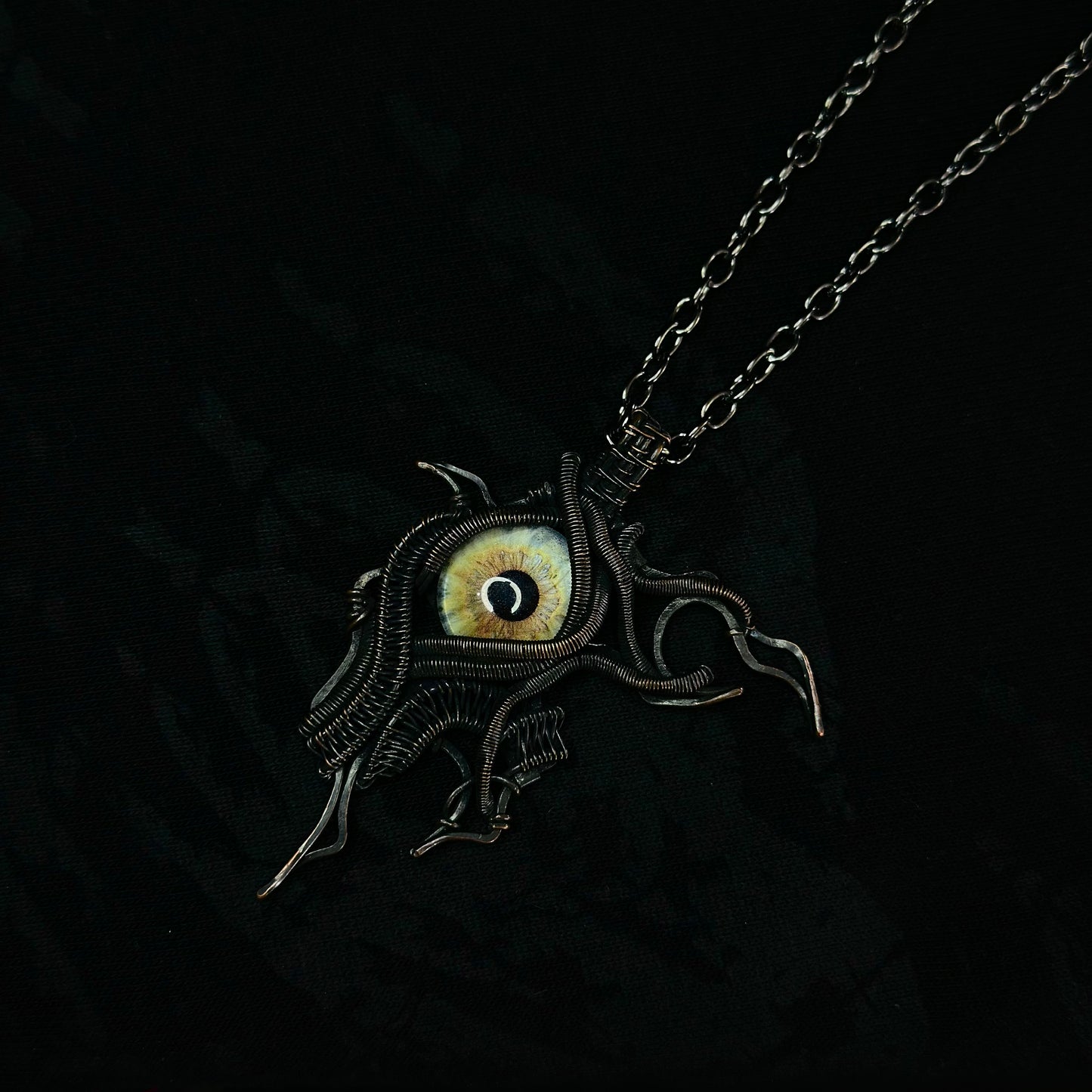 Always open eye pendant
